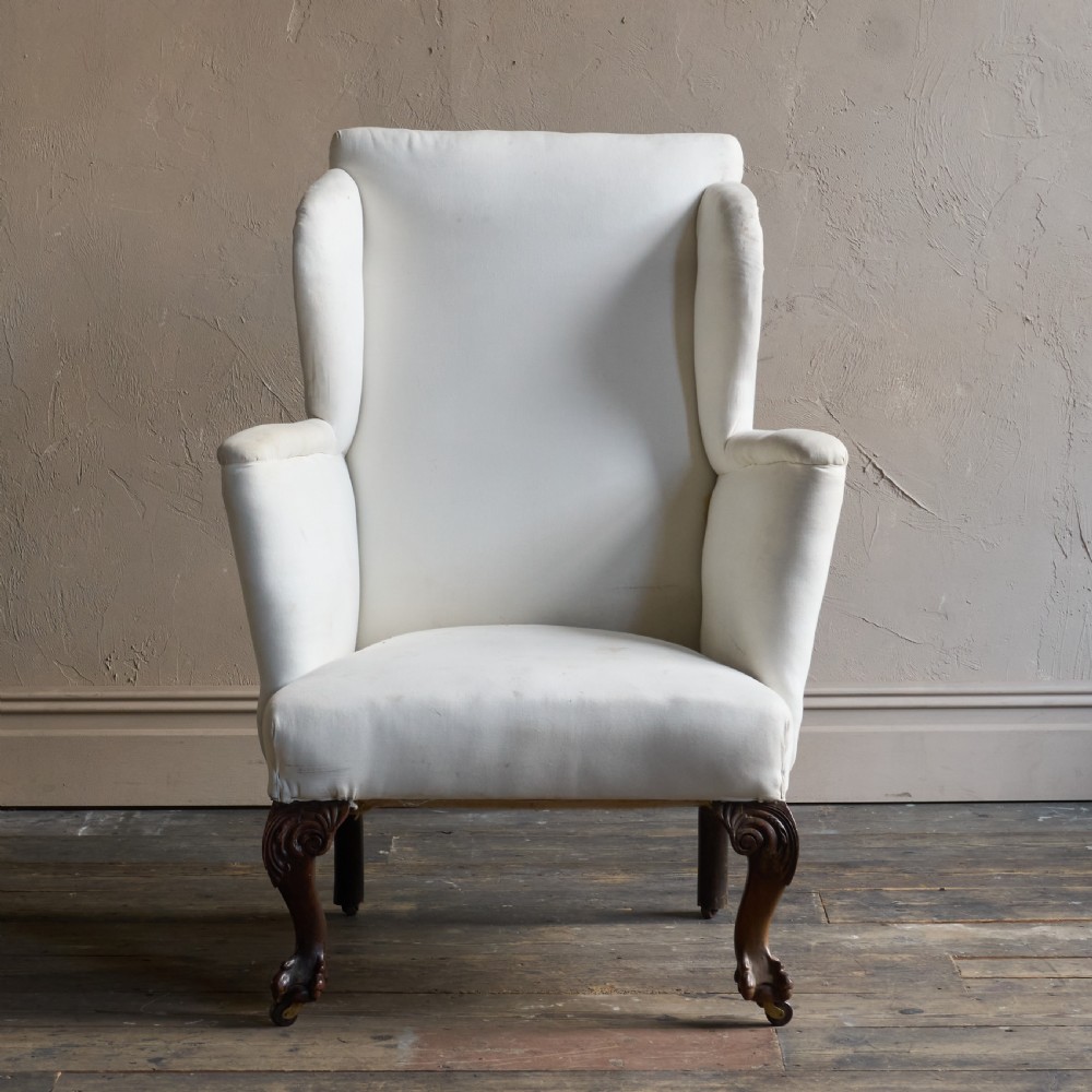A large George ll style wingback armchair View III
