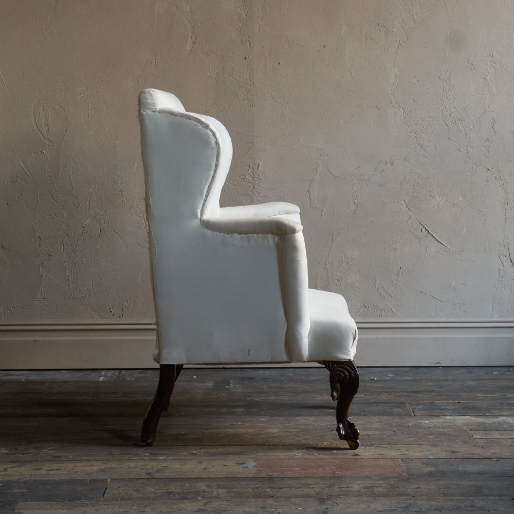 A large George ll style wingback armchair View IV
