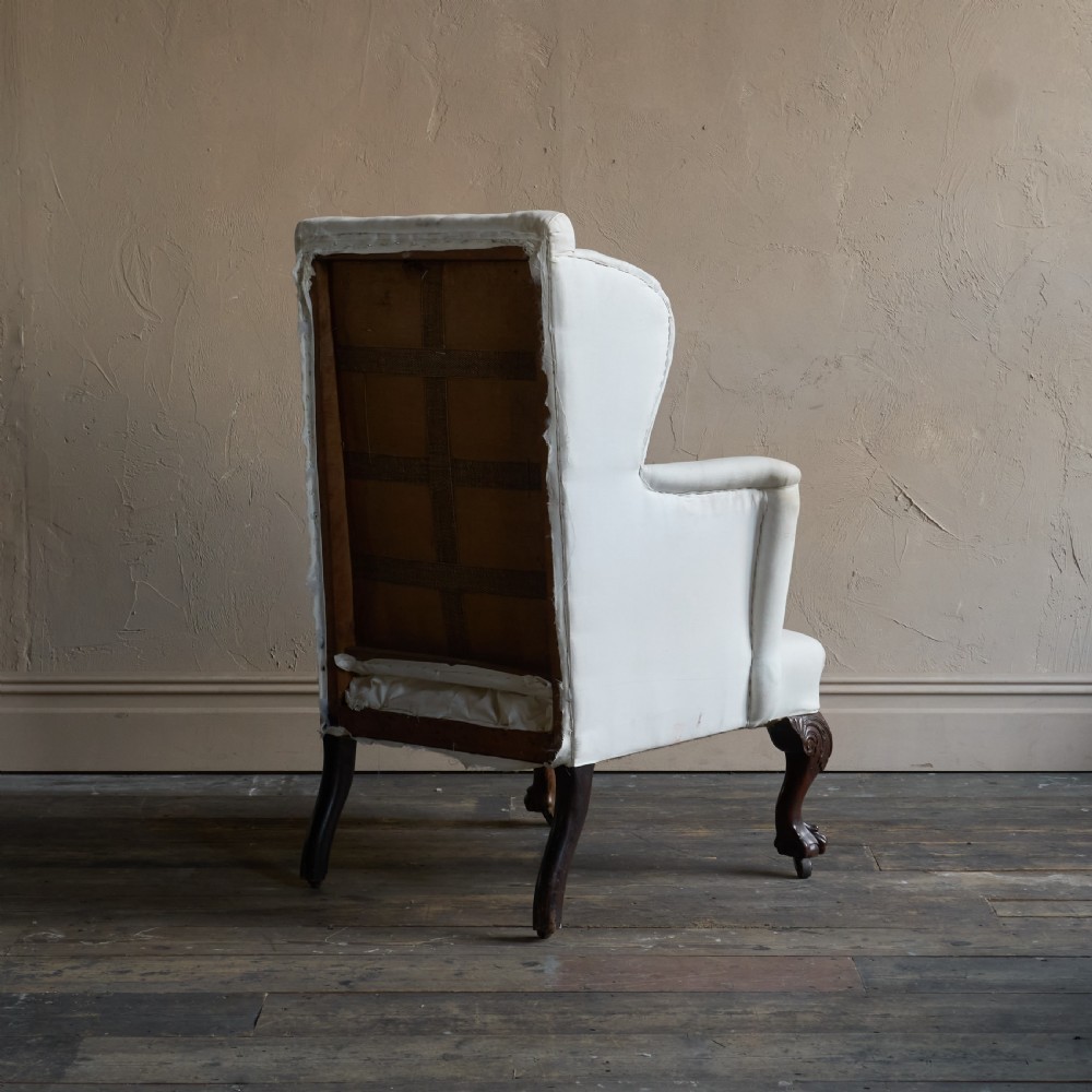 A large George ll style wingback armchair View V