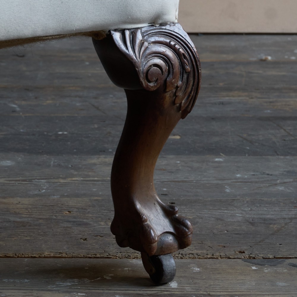 A large George ll style wingback armchair View VII