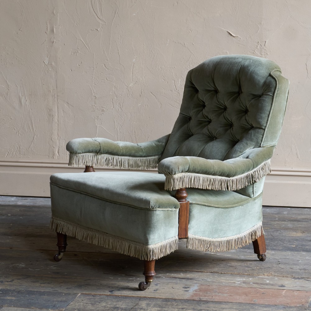 Antique Open Armchair in sage green velvet with tassel trim.
