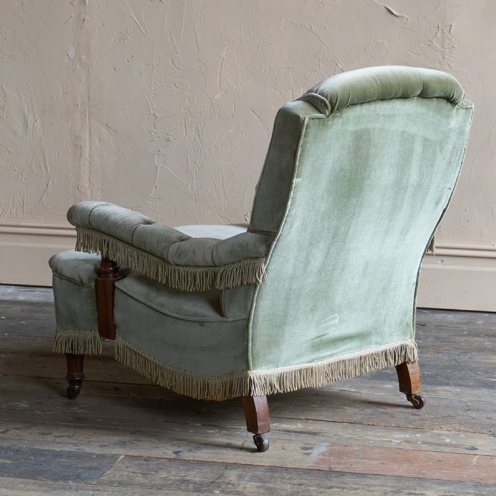 Antique Open Armchair in sage green velvet with tassel trim.
 View III