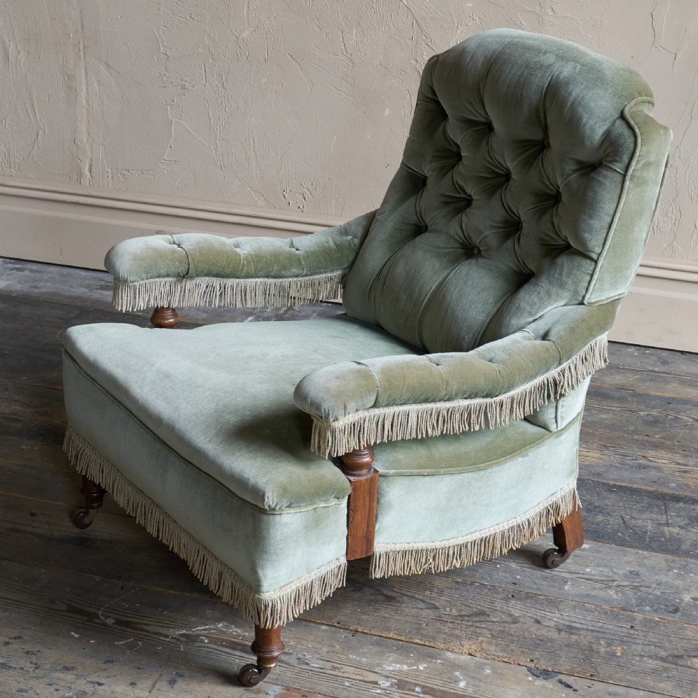 Antique Open Armchair in sage green velvet with tassel trim.
 View V