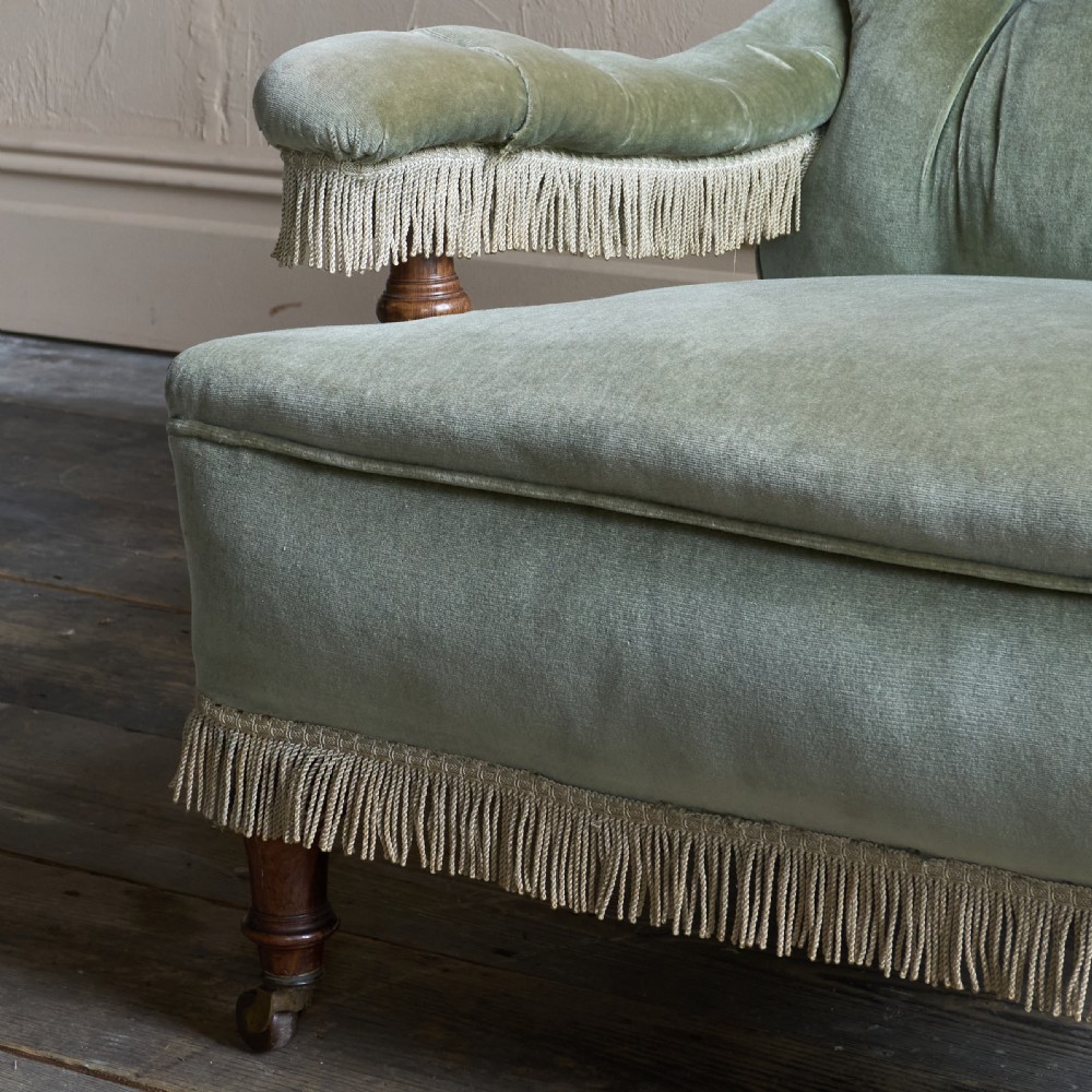 Antique Open Armchair in sage green velvet with tassel trim.
 View VI