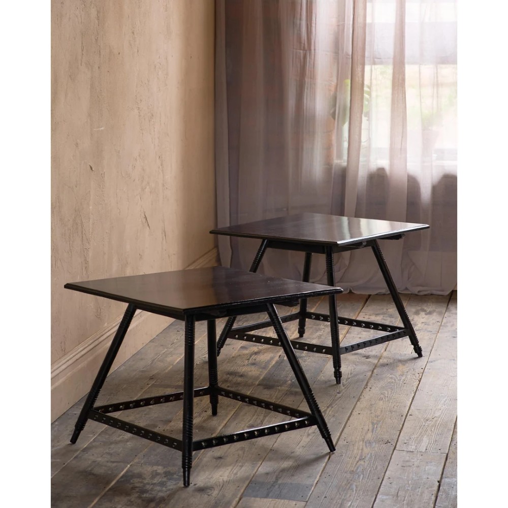 A matched pair of square ebonised wooden side tables with splayed turned legs and decorative pierced lower stretchers. View III