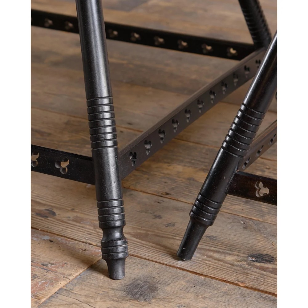 A matched pair of square ebonised wooden side tables with splayed turned legs and decorative pierced lower stretchers. View X