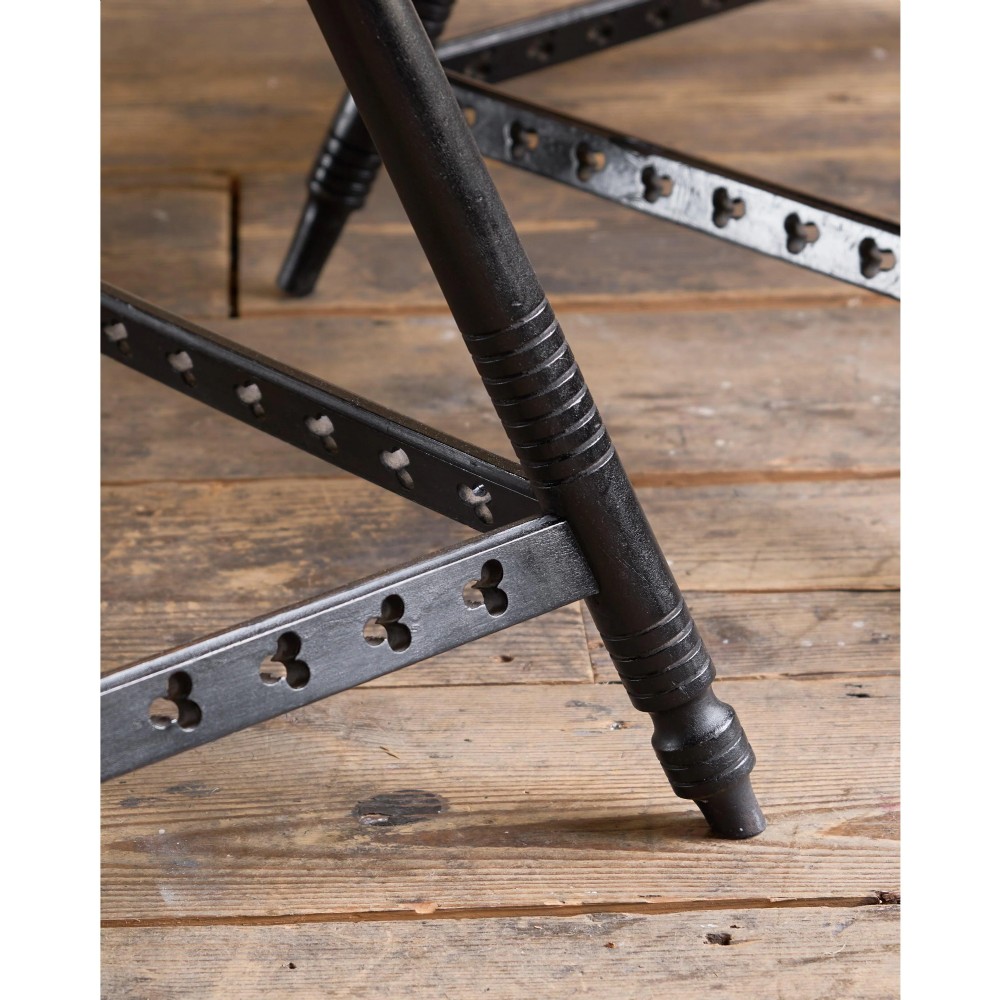 A matched pair of square ebonised wooden side tables with splayed turned legs and decorative pierced lower stretchers. View XII