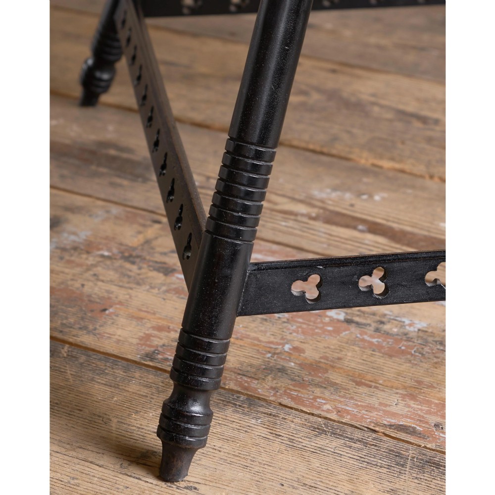 A matched pair of square ebonised wooden side tables with splayed turned legs and decorative pierced lower stretchers. View XIII