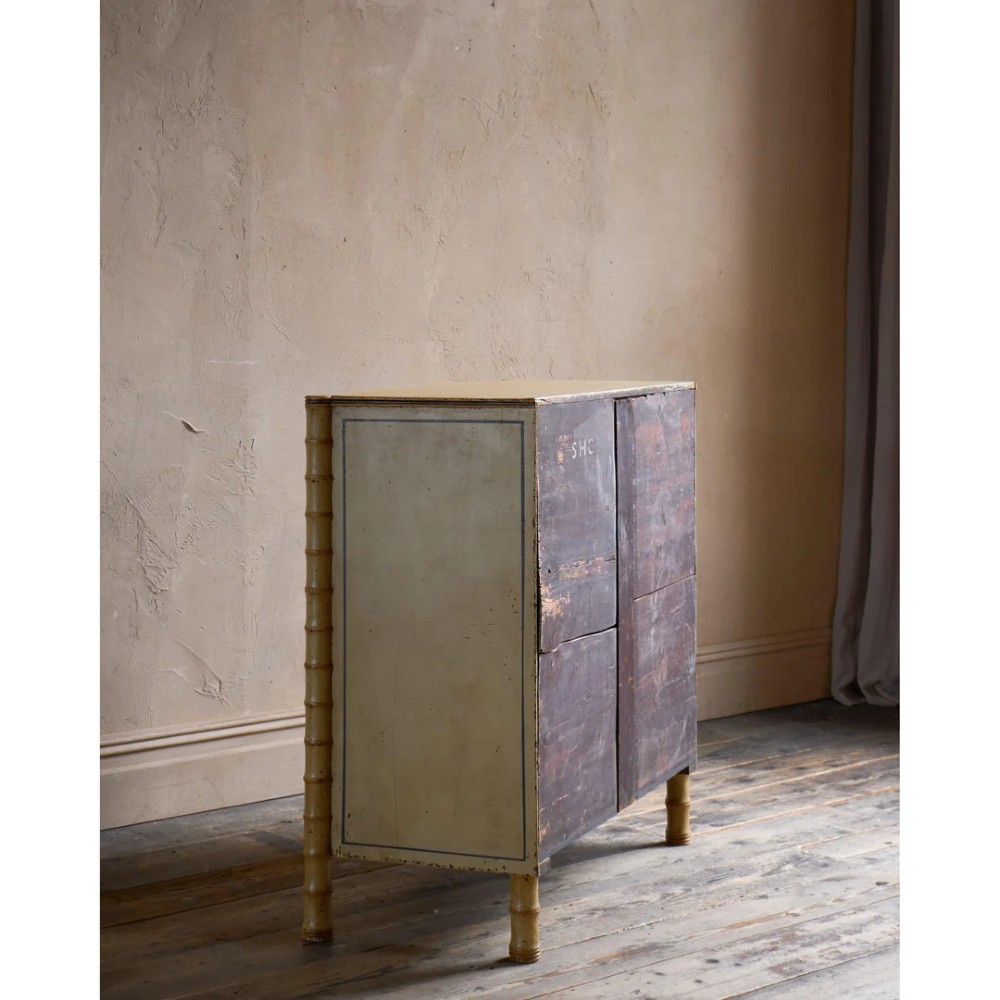 A Regency pale yellow painted chest of drawers featuring simulated bamboo turned corner columns and dark turned knobs. View VI