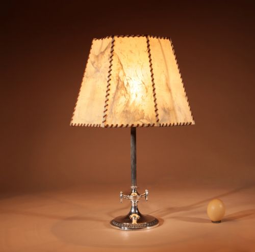 ART DECO POLISHED WHITE METAL AND PARCHMENT LEATHER TABLE LAMP CIRCA 192040