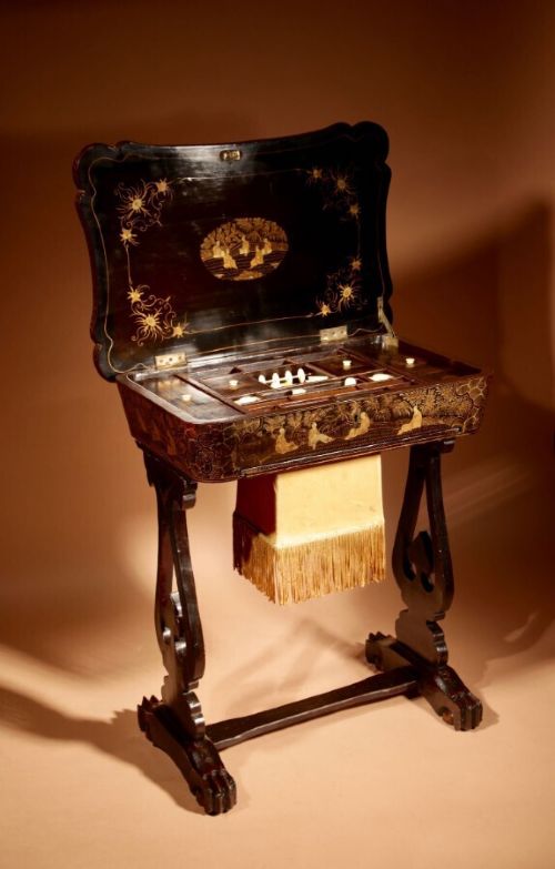 A ORIGINALLY LACQUERED SEWINGWORK TABLE STILL WITH THE ORIGINAL GOLD PAINT WORK CHINESE 19TH CENTURY