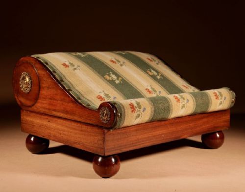 An Elegant Mahogany Foot Stool Continental Circa 1830.