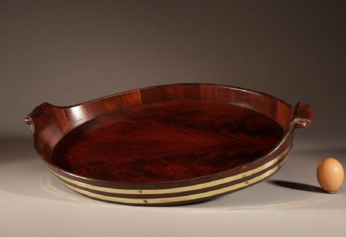 A Very Decorative and Useful Original Oval Mahogany and Brass Coopered Tray.