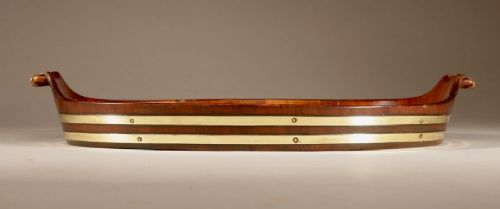 An oval mahogany serving tray featuring staved wood construction, twin carved side handles, and two horizontal brass bands securing the outer rim. View V