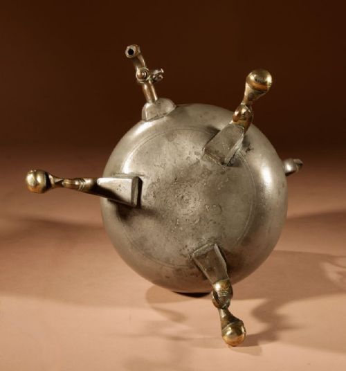 An 18th-century Dutch pewter kraantjeskan coffee urn featuring a bronze spigot tap, curved side handles, and three cabriole feet. View XIII