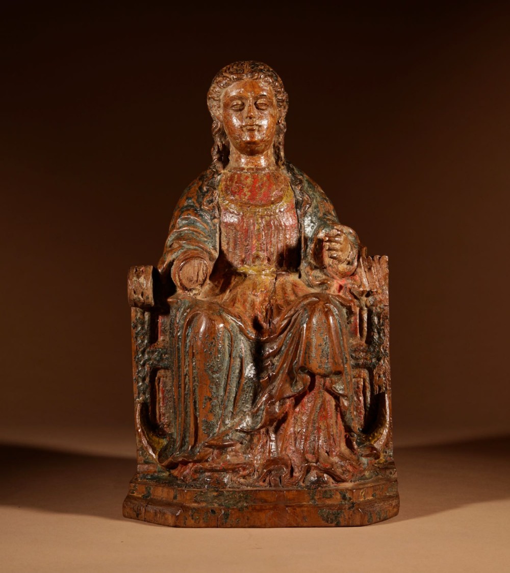 An Interesting Walnut Sculpture Of A Madonna Seated On A Throne, Circa 1570.