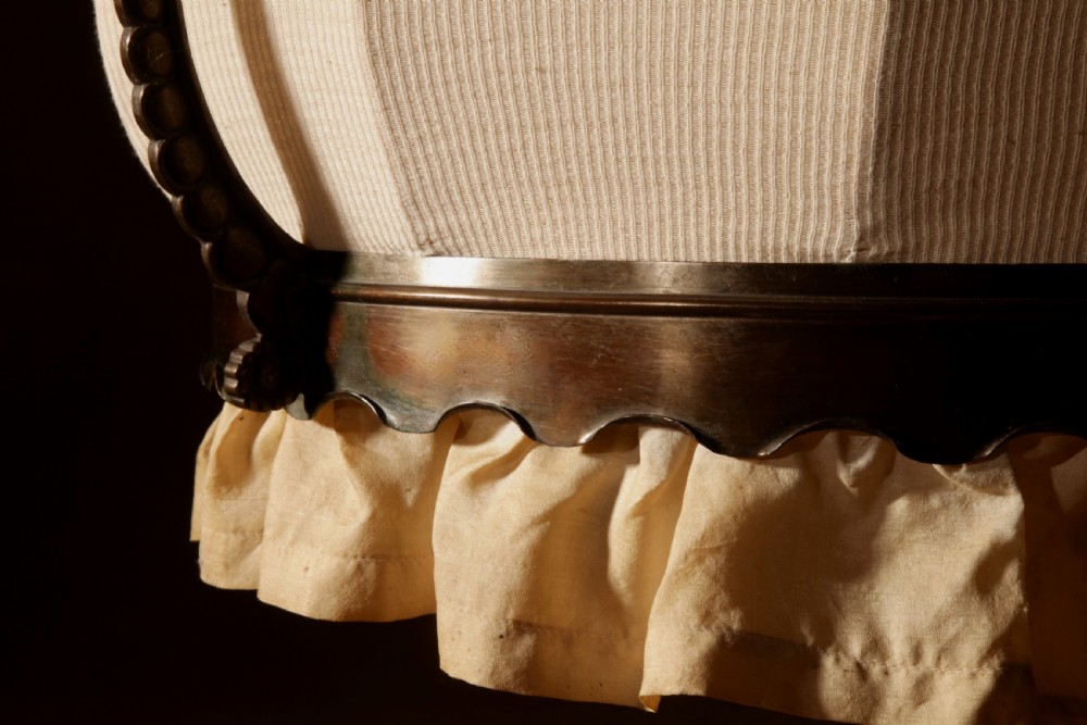 An early 20th-century Amsterdam School pendant light with a copper and brass frame, suspended by chain links, enclosing a pleated cream fabric shade. View VIII