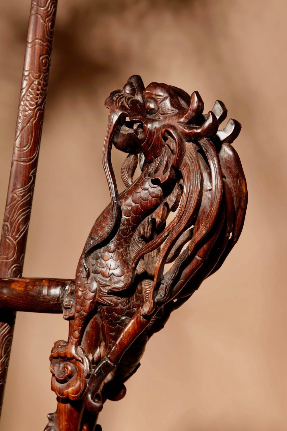 A large 19th-century Chinese ceremonial stand crafted from dark carved hardwood displaying a fan-shaped arrangement of polearms topped with brass finials. View III