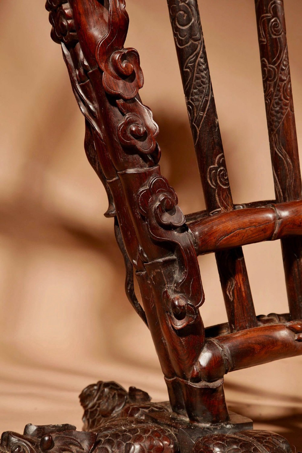 A large 19th-century Chinese ceremonial stand crafted from dark carved hardwood displaying a fan-shaped arrangement of polearms topped with brass finials. View VIII