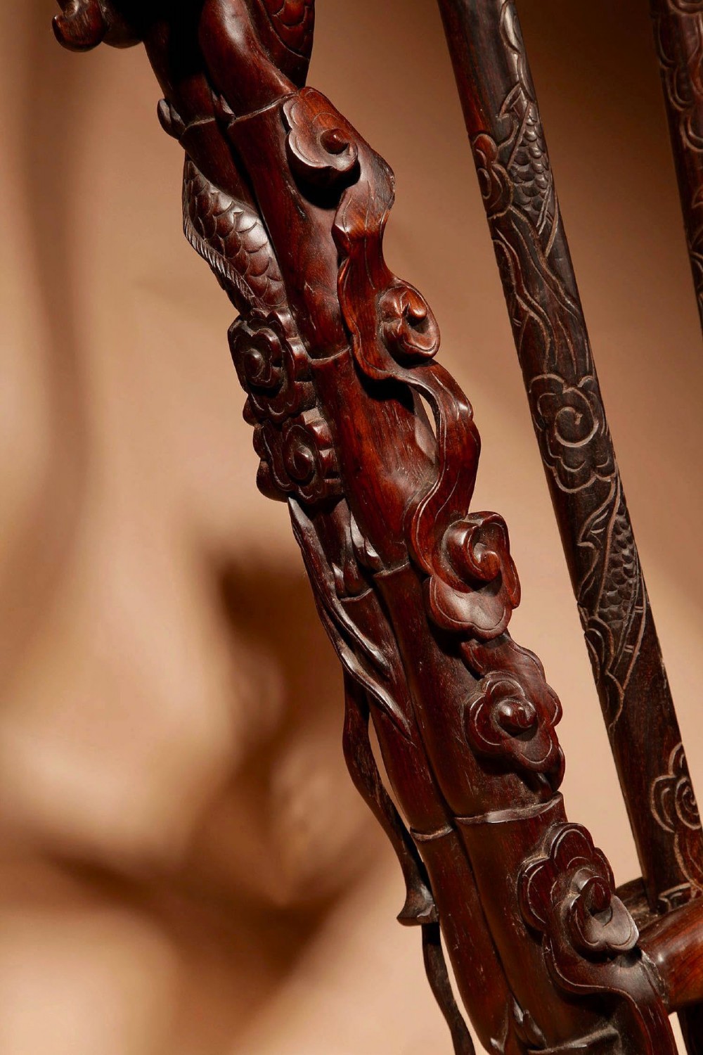 A large 19th-century Chinese ceremonial stand crafted from dark carved hardwood displaying a fan-shaped arrangement of polearms topped with brass finials. View IX