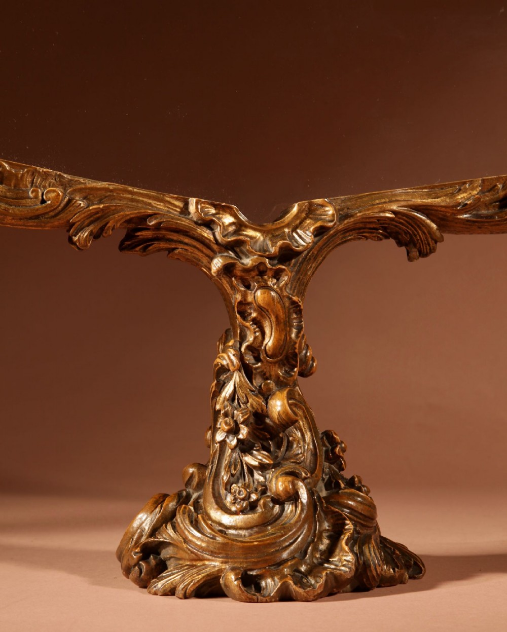 A fan-shaped glazed display case on an ornate Rococo style gilt metal pedestal base decorated with acanthus leaf scrollwork. View II