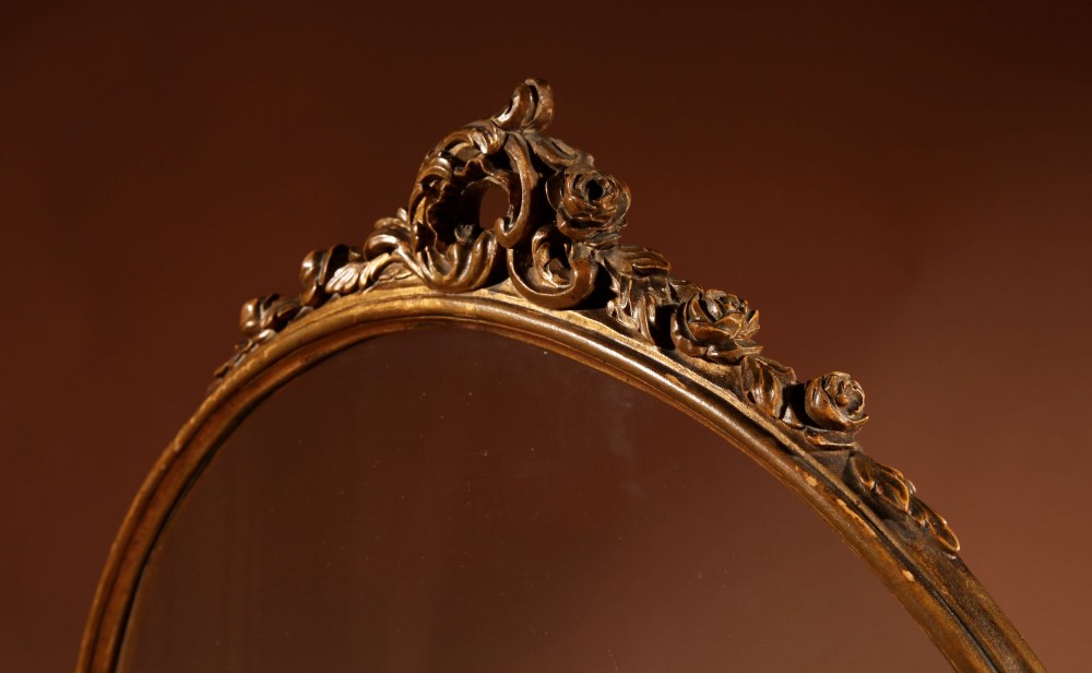 A fan-shaped glazed display case on an ornate Rococo style gilt metal pedestal base decorated with acanthus leaf scrollwork. View IX