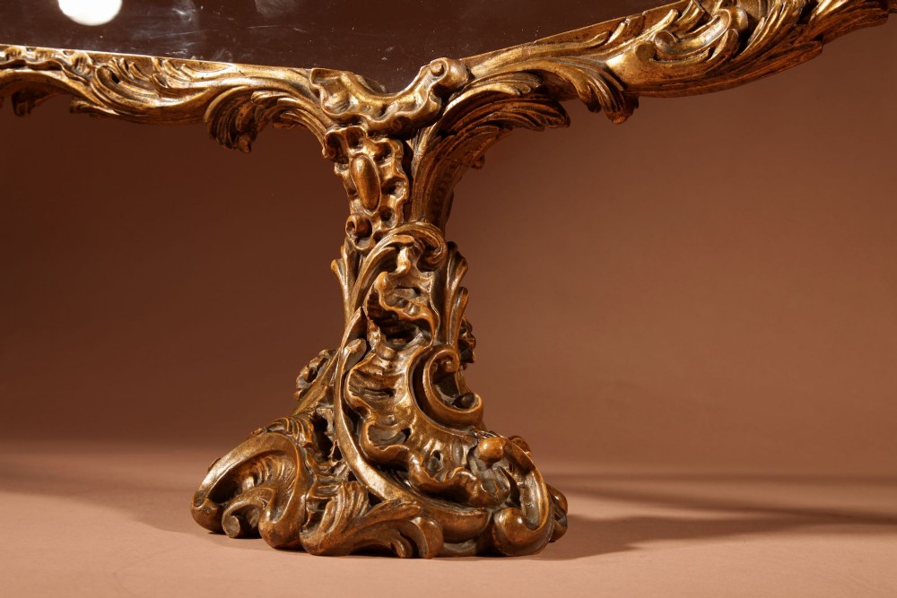 A fan-shaped glazed display case on an ornate Rococo style gilt metal pedestal base decorated with acanthus leaf scrollwork. View XII