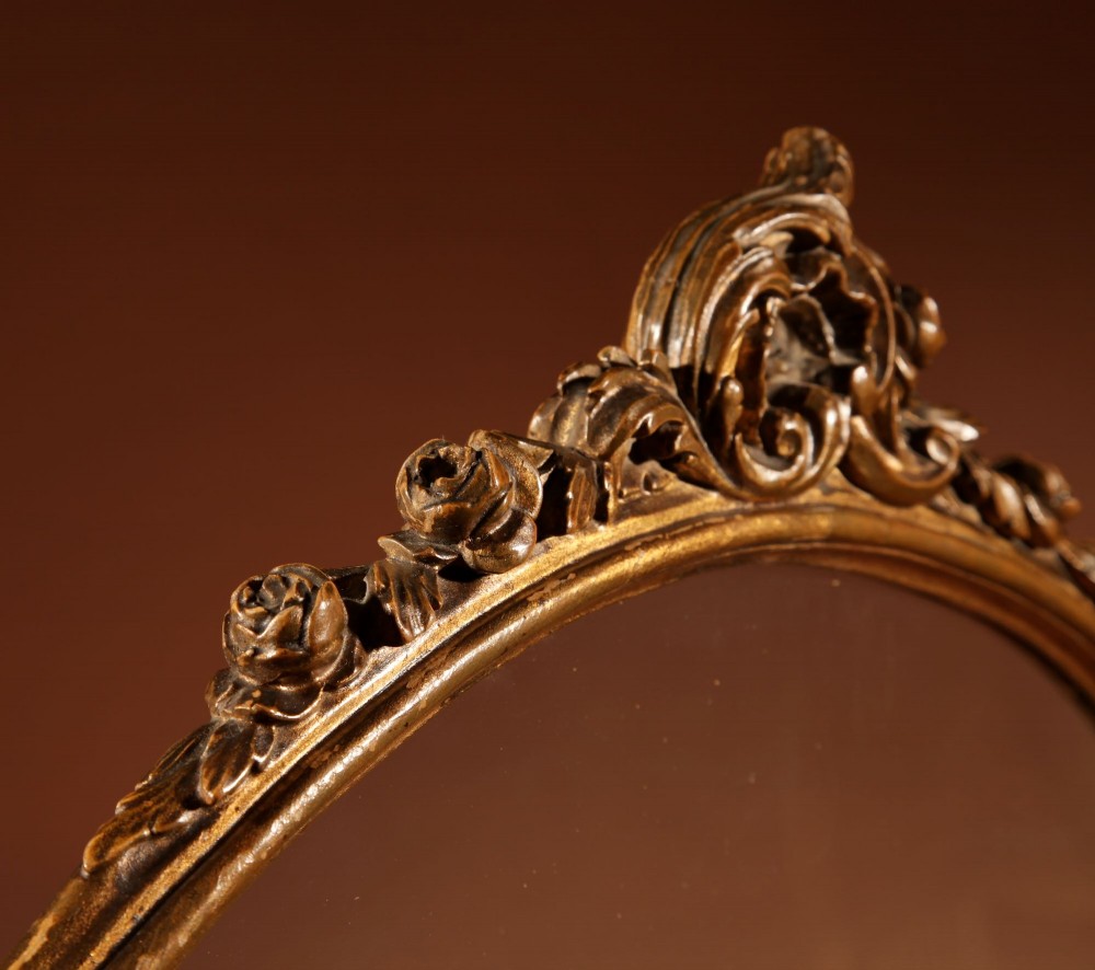 A fan-shaped glazed display case on an ornate Rococo style gilt metal pedestal base decorated with acanthus leaf scrollwork. View XV