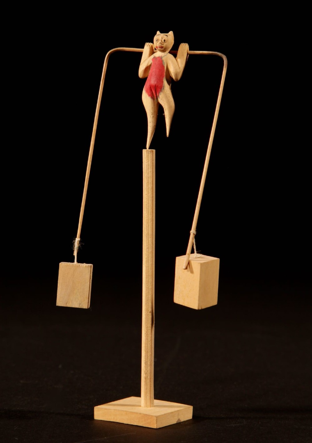 A collection of nine hand-carved light wood miniatures depicting various traditional Chinese daily life trades, vehicles, and activities. View II