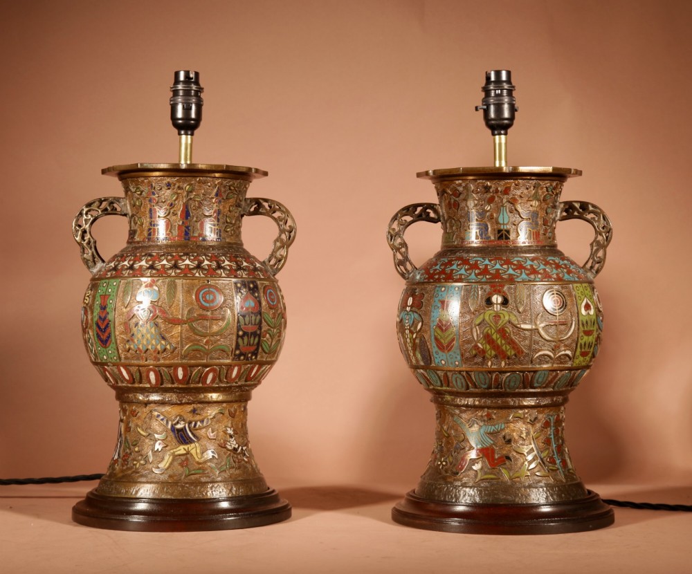 A pair of large Japanese champleve enamel bronze vase-form table lamps with twin handles and off-white pleated shades. View II