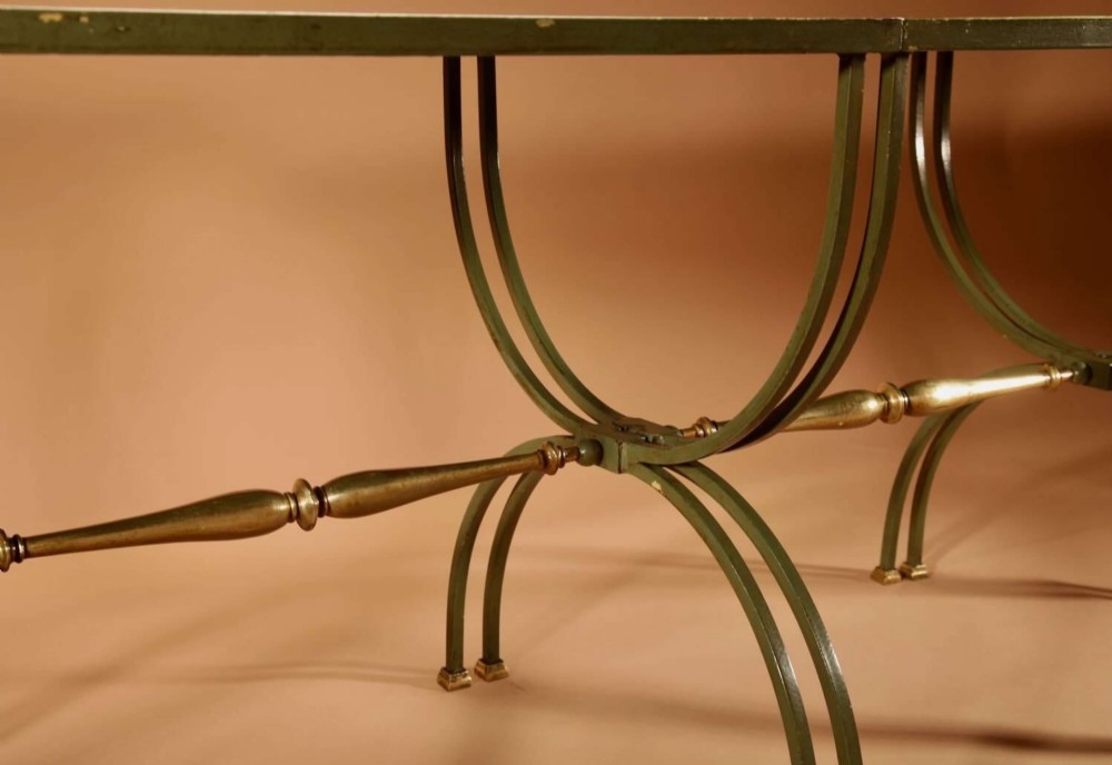 A four-part French Art Deco coffee table constructed from green wrought iron and brass with mirrored glass inserts featuring star motifs. View IV