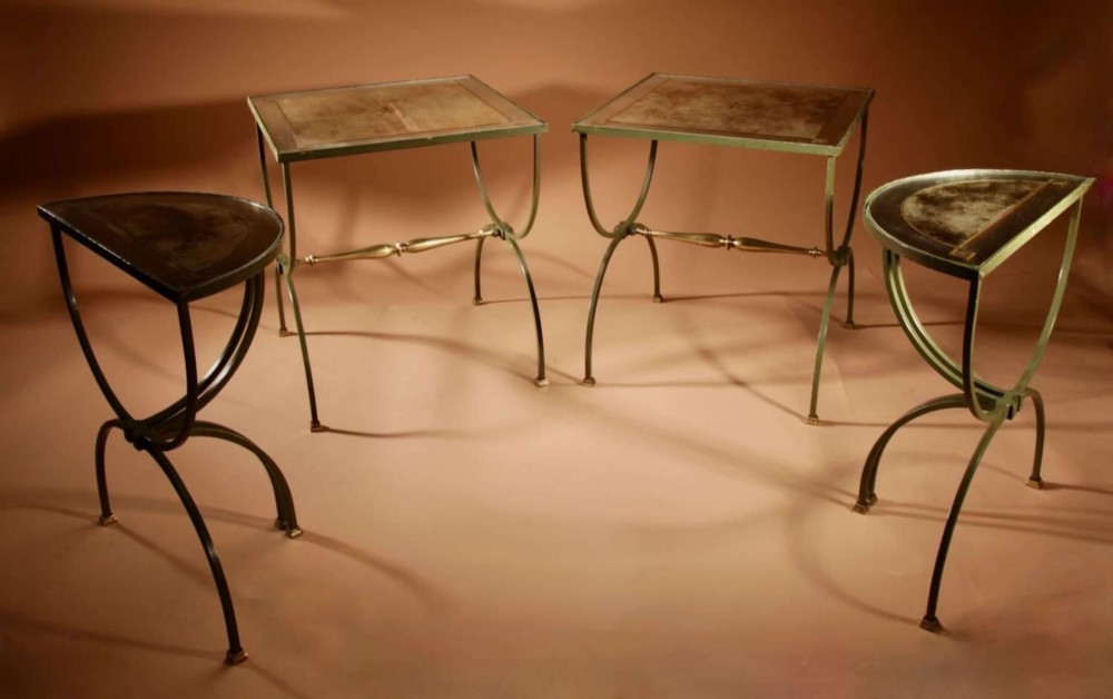 A four-part French Art Deco coffee table constructed from green wrought iron and brass with mirrored glass inserts featuring star motifs. View VIII