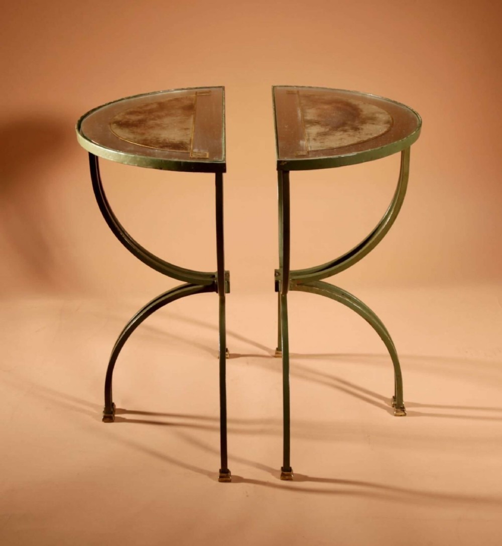 A four-part French Art Deco coffee table constructed from green wrought iron and brass with mirrored glass inserts featuring star motifs. View X