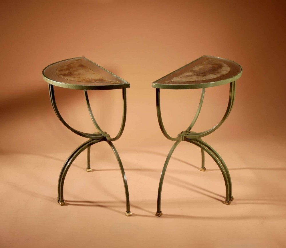 A four-part French Art Deco coffee table constructed from green wrought iron and brass with mirrored glass inserts featuring star motifs. View XII