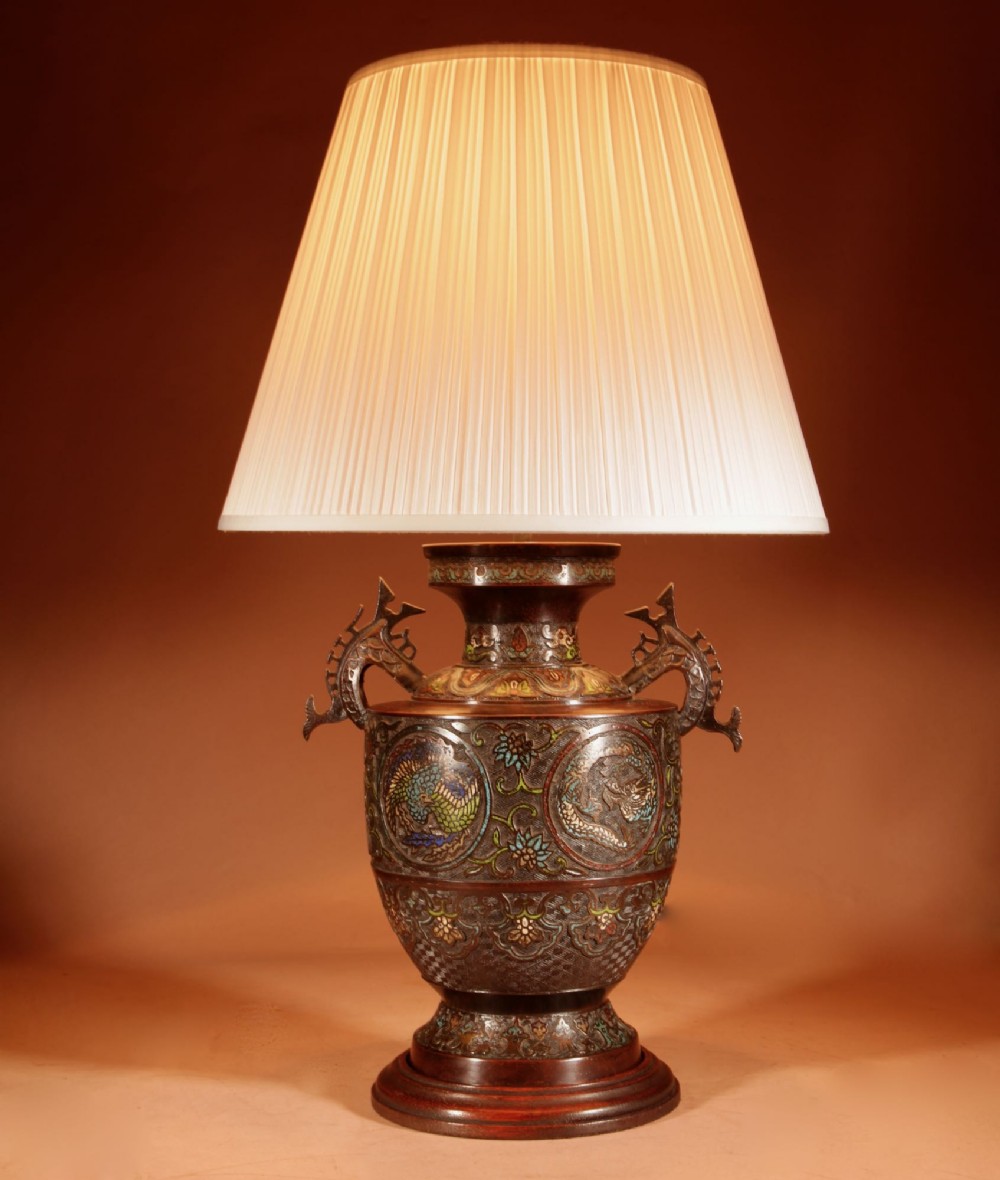 A Japanese champleve bronze vase base featuring cast dragon handles and polychrome enamel roundels, topped with a cream pleated shade. View II