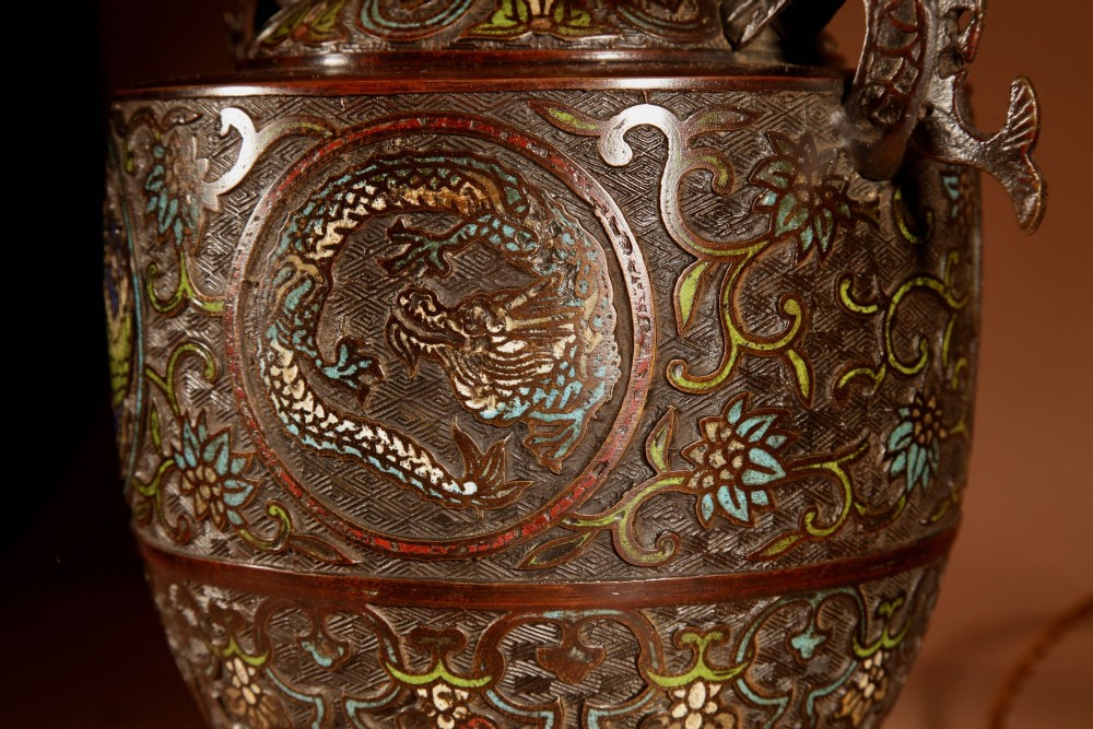 A Japanese champleve bronze vase base featuring cast dragon handles and polychrome enamel roundels, topped with a cream pleated shade. View VIII