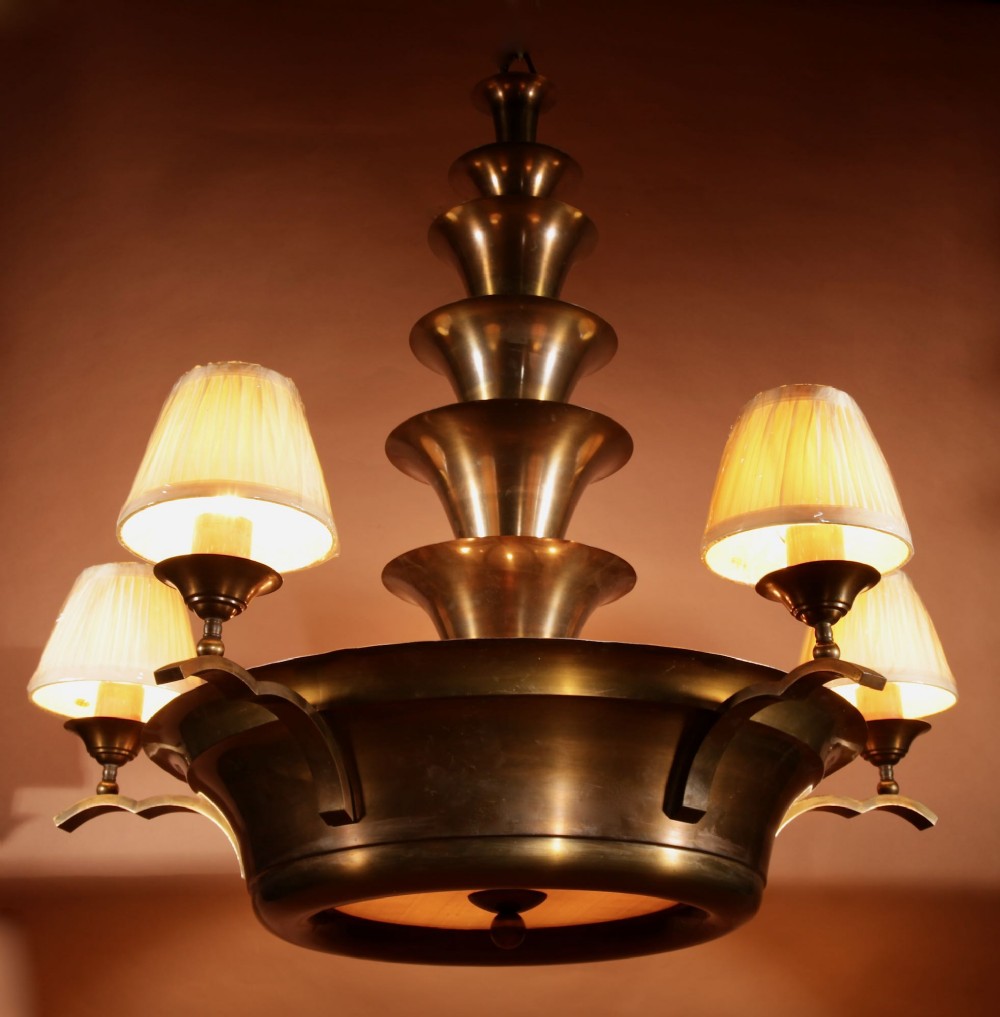 An Amsterdam School bronze five-light chandelier featuring a tiered central column and small pleated lampshades. View II