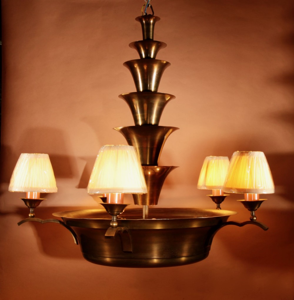 An Amsterdam School bronze five-light chandelier featuring a tiered central column and small pleated lampshades. View IV