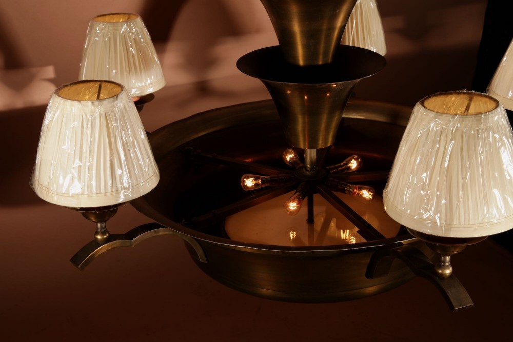 An Amsterdam School bronze five-light chandelier featuring a tiered central column and small pleated lampshades. View IX