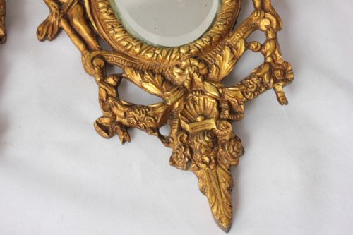 fig 1. Pair of Small Oval 19th Century French Gilt Brass Cherub Wall Mirrors