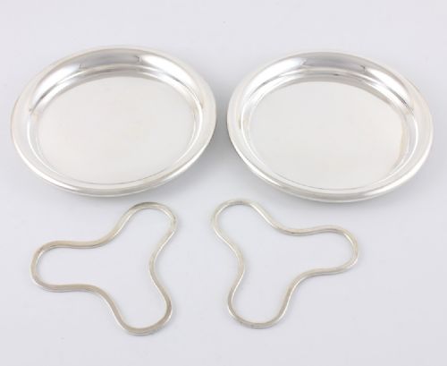 fig 2. Two Christofle France Silver Plate Wine Bottle Coasters & Trivets.