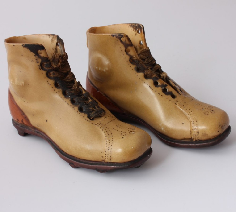 Ceramic Studded Boots. 19th Century.