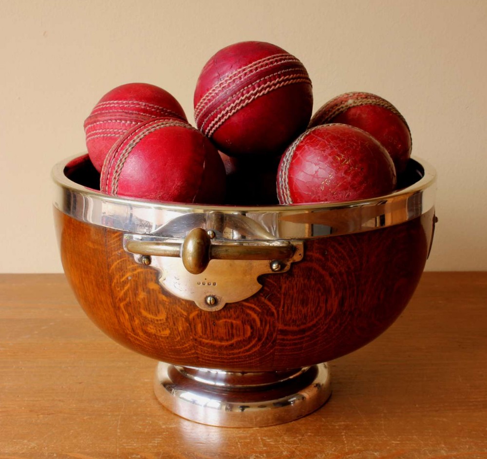 English Oak Silver Plated Trophy Bowl & 12 Leather Cricket Balls.