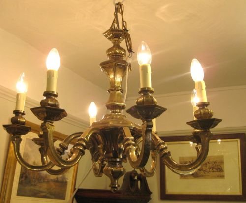 An Eight Arm Antique Brass Chandelier