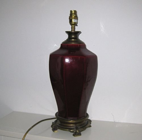 An Antique Burgundy Porcelain Lamp