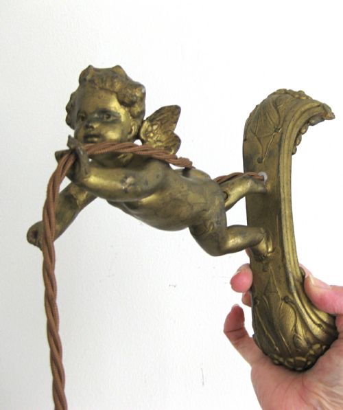 fig 1. A GILDED BRASS CHERUB WALL LIGHT