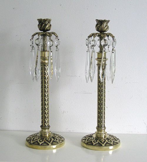 A Pair of Victorian Decorative Brass Candlesticks