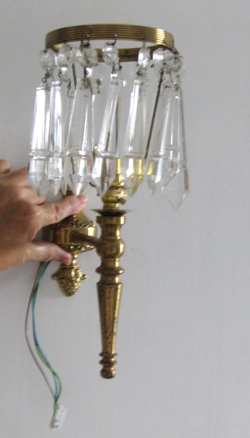 fig 2. A SET OF THREE BRASS WALL LIGHTS WITH CRYSTAL DROP SHADES
