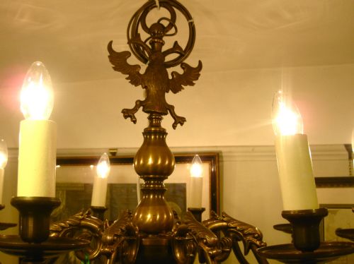 fig 1. A VICTORIAN BRASS EIGHT ARM CHANDELIER WITH DOLPHINS