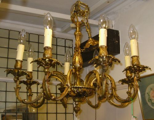 An Early 20thc Eight Arm Brass Chandelier